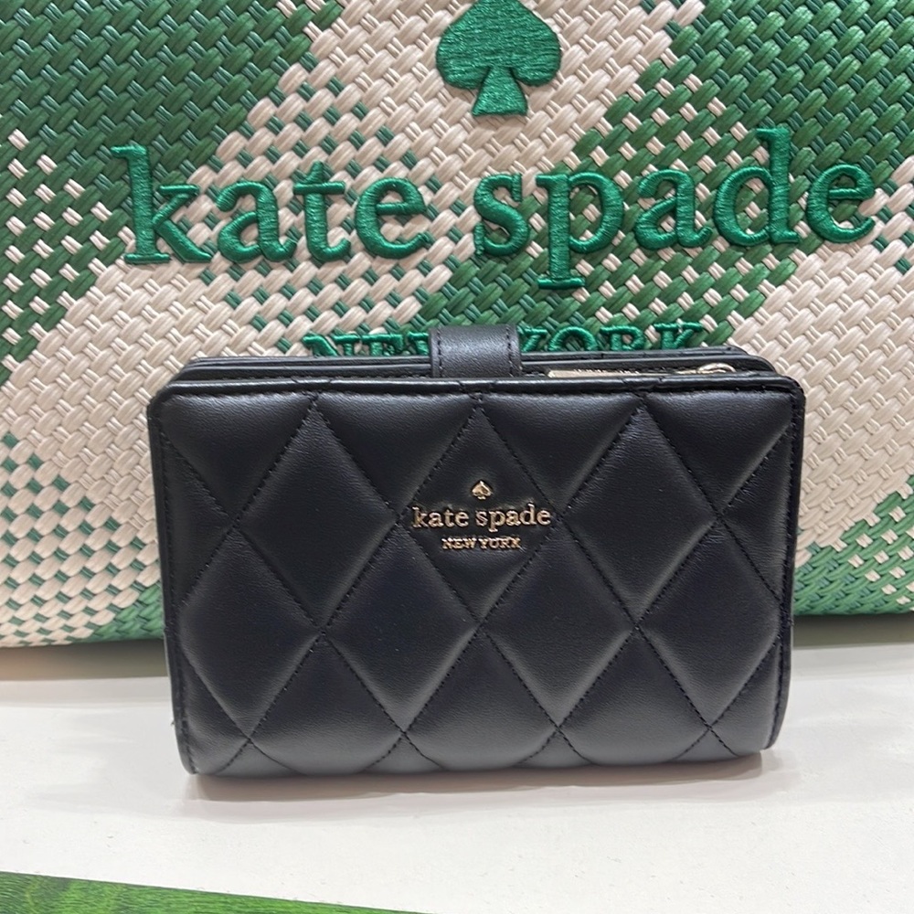 Kate Spade Carey Medium Compartment Bifold Wallet
COLOR: Black
NWT - Picture 10 of 16